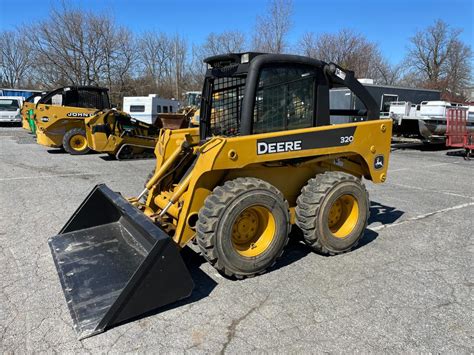 320 john deere skid steer sale|john deere 320 value.